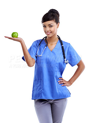 Buy stock photo Nurse, woman and apple on hand in studio for healthcare and healthy food for natural choice. Medical worker or doctor in portrait with fruit in palm for nutrition and gut health on white Background