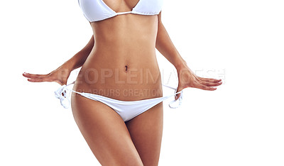 Buy stock photo Cropped studio shot of a woman in a bikini isolated on white
