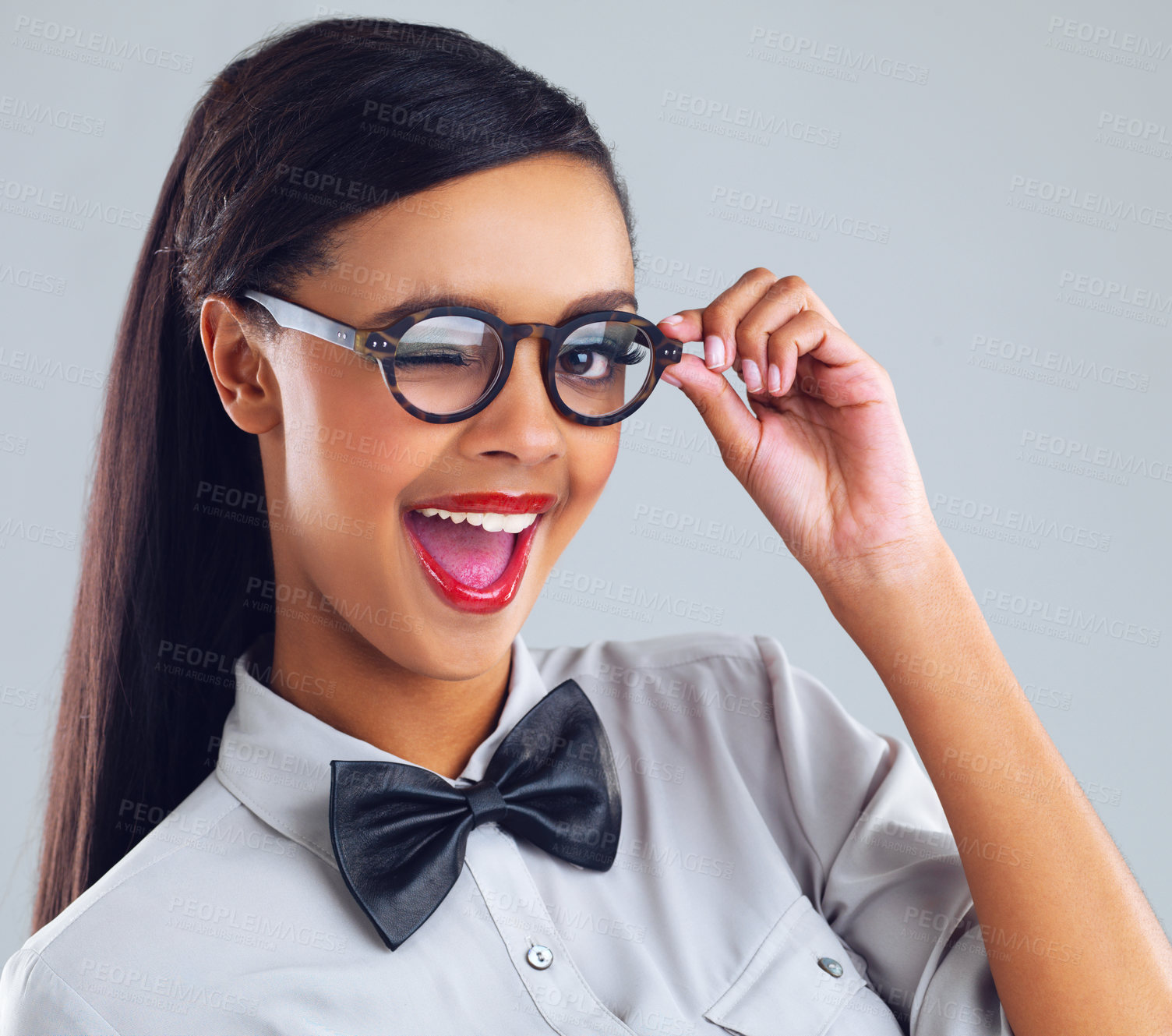 Buy stock photo Happiness, girl and wink with glasses for fashion in studio for designer, flirting and quirky on backdrop. Gen z, stylish and aesthetic portrait of young woman for trendy, sunglasses, and clothing.