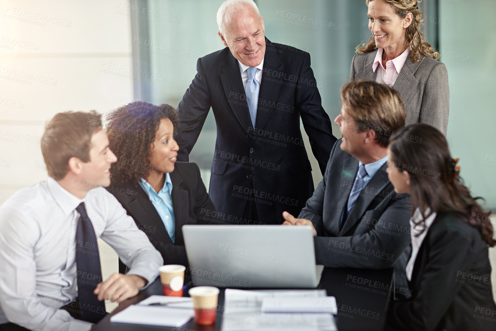 Buy stock photo Corporate, ceo with funny joke in business meeting and in office sitting at desk with laptop. communication or planning, cooperation and teamwork or collaboration laughing with coworkers at work