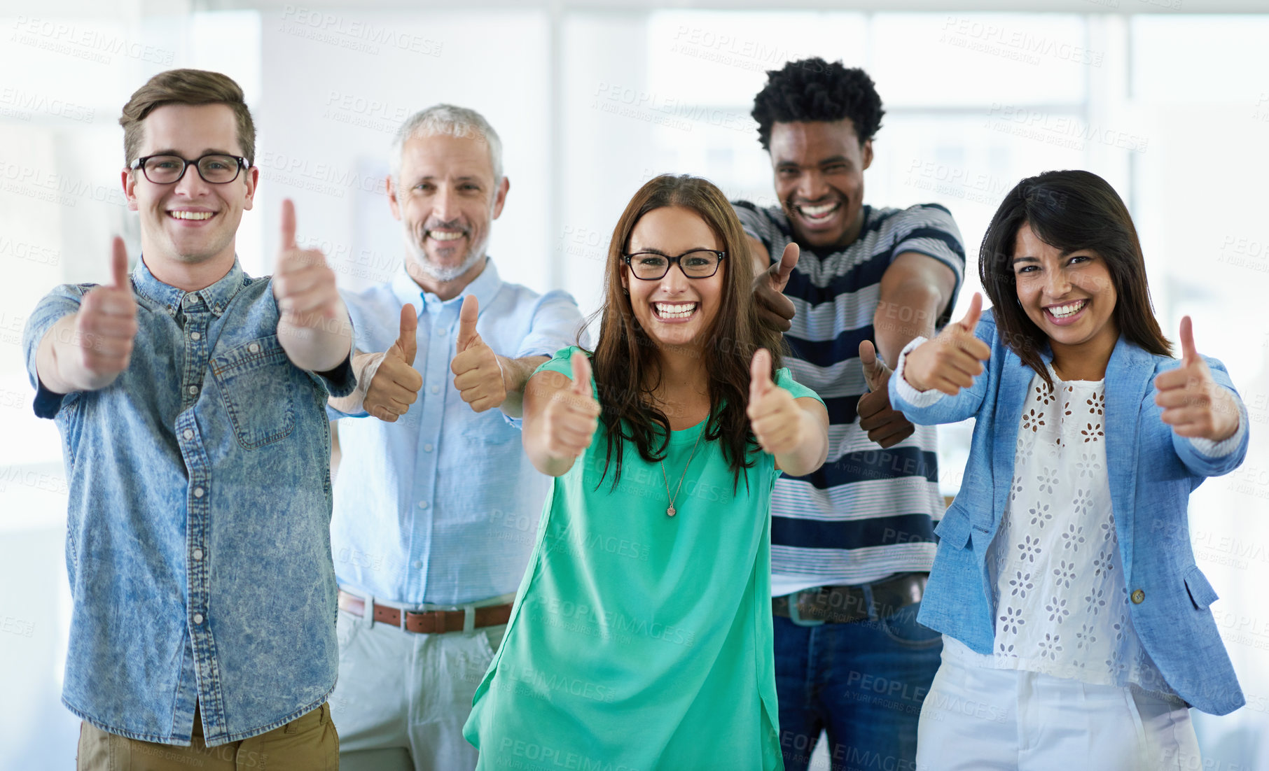 Buy stock photo Cropped portrait of a group of businesspeople giving the thumbs up