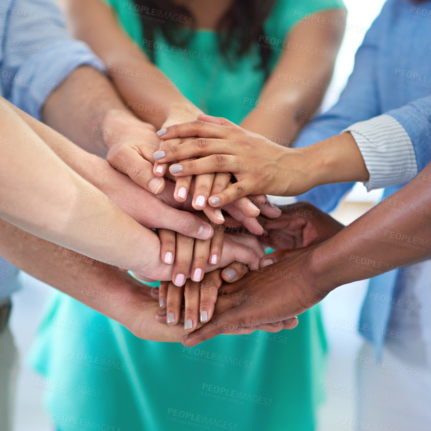 Buy stock photo Cropped shot of a creative business team in a huddle