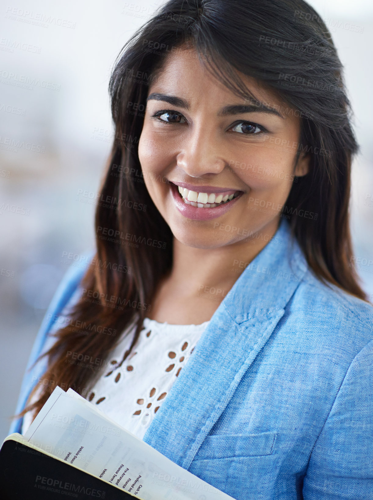 Buy stock photo Cropped portrait of a young businesswoman in the office corridor