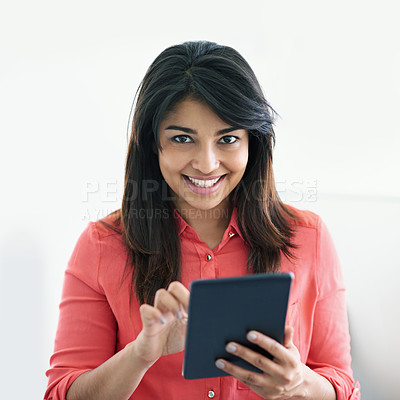 Buy stock photo Cropped shot of a young creative professional using a digital tablet