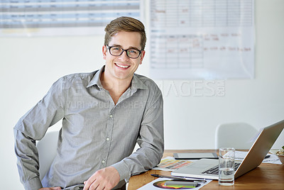 Buy stock photo Portrait of a male designer sitting at his office desk
