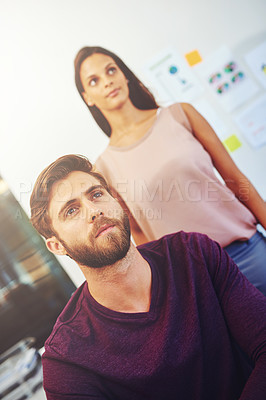 Buy stock photo Cropped shot of two young architects in their office