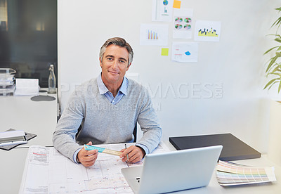 Buy stock photo Cropped portrait of a mature architect working on his laptop