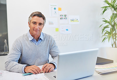 Buy stock photo Cropped portrait of a mature architect working on his laptop