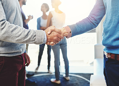 Buy stock photo Closeup shot of two businesspeople shaking hands