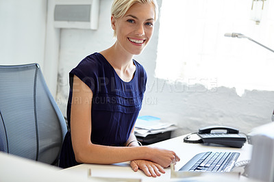 Buy stock photo Cropped portrait of a young businesswoman working in her office
