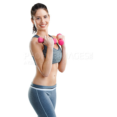 Buy stock photo Studio shot of a fit young woman working out with dumbbells isolated on white
