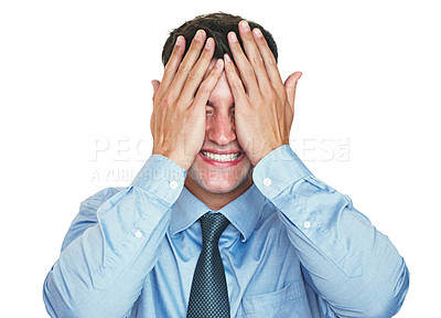 Buy stock photo Studio shot of a young businessman covering his face against a white background