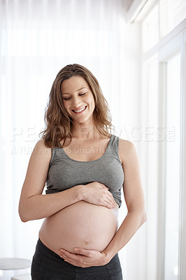 Buy stock photo Happy woman, pregnant and dream with stomach for maternity, expecting or baby belly at home. Female person, motherhood or thinking with smile for pregnancy, trimester or starting family at house