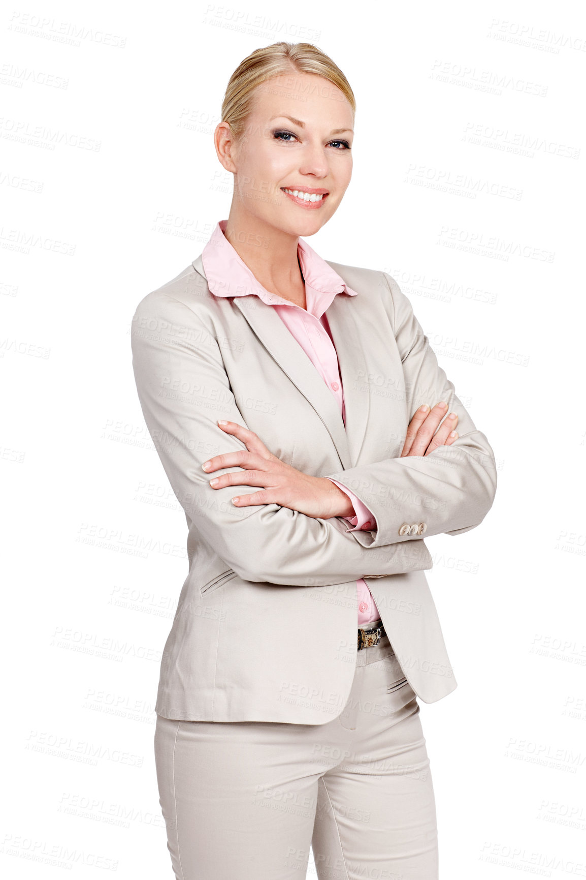 Buy stock photo Studio portrait of a businesswoman standing with her arms folded against a white background