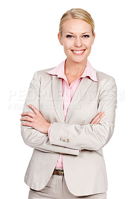 Buy stock photo Studio portrait of a businesswoman standing with her arms folded against a white background