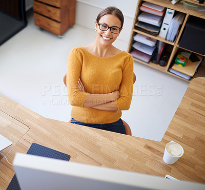 Buy stock photo Office, portrait and woman at desktop with project in creative workplace and confident with arms crossed. Calm, person and productivity in company with pride, happiness and relax on coffee break