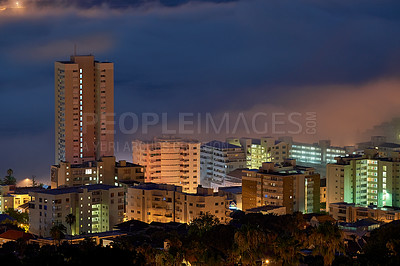 Buy stock photo Building, city and night with architecture or infrastructure outdoor on sky background for commercial business. CBD, corporate skyscraper development of urban town in evening for economy or finance