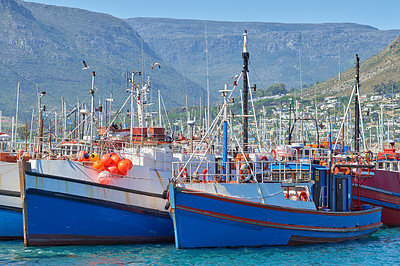 Buy stock photo Harbor, ship and ocean for fishing with boats for shipping, coastline industry and summer scenery. Port, dock and water, waves and sea for sailing, nature and seascape bay with holiday destination