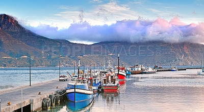 Buy stock photo Harbor, ship and sea for fishing with boats for shipping, coastline industry and summer scenery. Port, dock and water, waves and ocean for sailing, nature and seascape bay with holiday destination