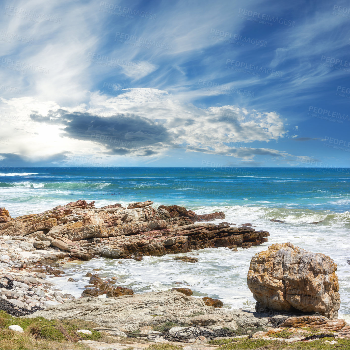 Buy stock photo Ocean, water and rocks in nature outdoor for travel destination, coat environment and natural beauty. Blue sky, beach and scenery for seaside peace, tourism journey with adventure location of view