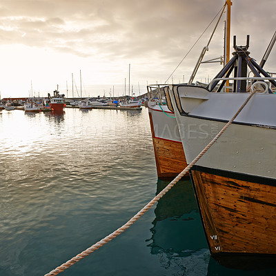 Buy stock photo Ship, harbor and sea for cargo, transportation and travel with mountains, water and sunshine. Boat, sailing and ocean as landscape in New York with sky for international export, delivery and trade