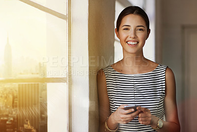 Buy stock photo Business woman, phone and portrait by window with chat app, networking and communication in office. Accountant lady, typing and mobile for economy news, stock market forecast and investment website