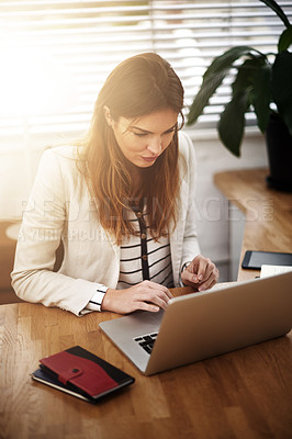 Buy stock photo Lens flare, business woman and laptop in office for email, internet and communication by desk for job in corporate career. Professional, employee and financial broker with technology in workspace