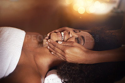 Buy stock photo Black woman, hands and masseuse for facial massage, beauty and bodycare at spa for stress relief and wellness. Dermatology, face treatment and healing for zen, self care and happy at luxury resort
