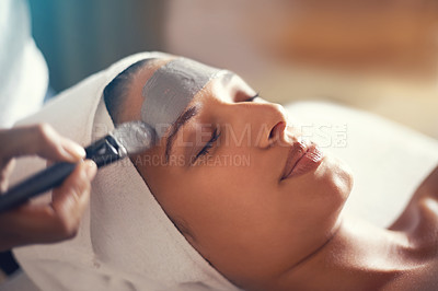Buy stock photo Facial, mask and cosmetic treatment for woman in spa for relax, wellness and beauty for break and skincare. Young person with eyes closed and towel on head with product on face for hygiene and care