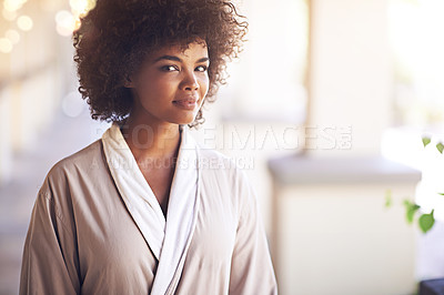 Buy stock photo Spa, woman and portrait with skincare in a bathrobe for wellness, cosmetics and beauty treatment. Health, relax and resort with an African female person ready for dermatology at a hotel bathroom