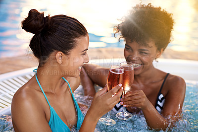 Buy stock photo Women, friends and Champagne in jacuzzi at spa, self care and relax on pamper day for wellness and cold beverage. Water, bubbles and alcohol drink in hot tub for detox and friendship date for bonding