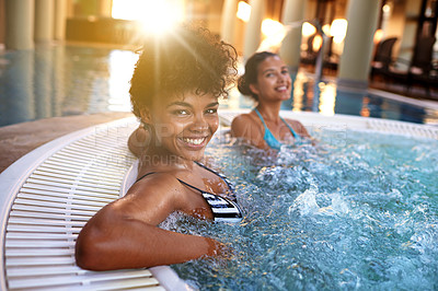 Buy stock photo Excited woman, portrait and relax with water in jacuzzi at hotel, resort or hot tub spa together. Happy female person or friends with smile for relaxation, hospitality or heated bath by indoor pool