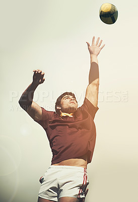Buy stock photo Rugby, sports and athlete and man and ball on field for training, health and stadium practice. Challenge, competition and performance with male person in outdoor pitch for exercise, games and workout
