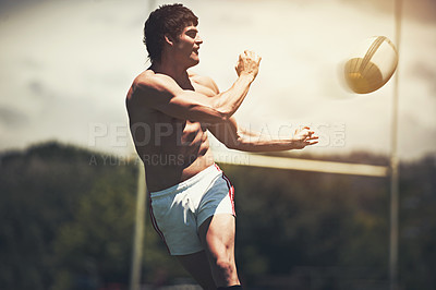 Buy stock photo Male player, rugby ball and playing sport for game, fitness recreation and training on field outdoor. Determined sportsman or energetic athlete and muscular for competition skill strategy on match 