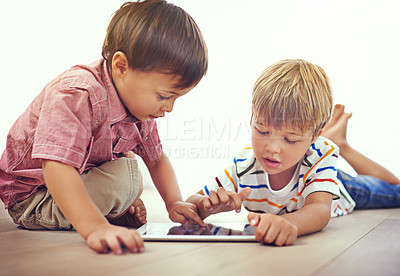 Buy stock photo Tablet, learning and children playing together in family home for fun and education. Male kids or friends on floor to play and streaming internet for development with app, game and online video