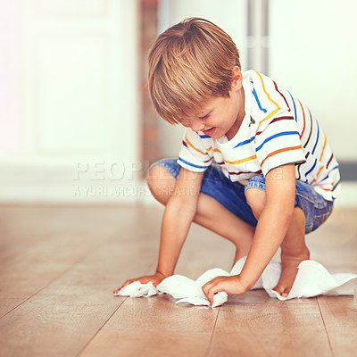 Buy stock photo Boy, floor and cleaning in home for mess, spill or household chores for childhood development. Little boy, toilet paper and maintenance in house with hygiene, housework and learning responsibility