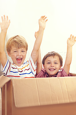 Buy stock photo Box, children or portrait of siblings playing in house for fun, bonding or hands up game. Cardboard, learning and excited kids in living room for celebration, imagine or rollercoaster fantasy at home