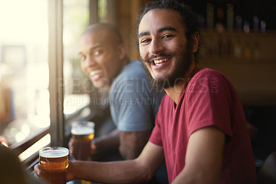 Buy stock photo Male people, beer and chill at pub, smile and relax indoor for fun and bonding in summer to destress. Friends, bar and funny for social, guys and alcohol together and laughing for fun and weekend.