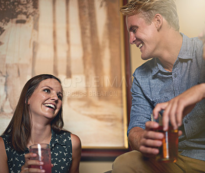 Buy stock photo Love, smile and couple drinking in pub together for bonding, conversation and dating on weekend. Beer, happy or party with young man and woman at bar to drink alcohol from glass for celebration