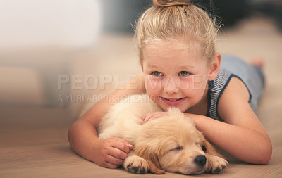 Buy stock photo Young girl hug her puppy, relax at home and happy with sleeping golden retriever dog and child with smile. Happiness, pet care and love with female kid with her domestic animal lying on wood floor