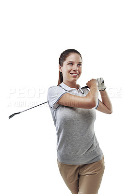 Buy stock photo Studio shot of a young golfer practicing her swing isolated on white