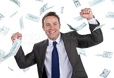 Buy stock photo Cropped portrait of a businessman cheering as money rains down against a white background