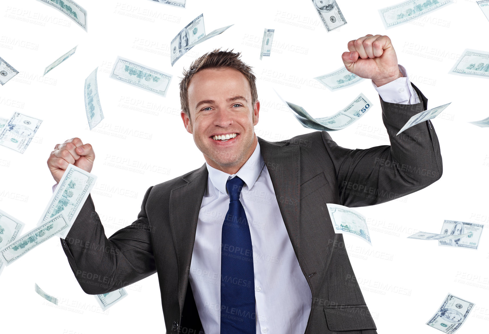 Buy stock photo Cropped portrait of a businessman cheering as money rains down against a white background