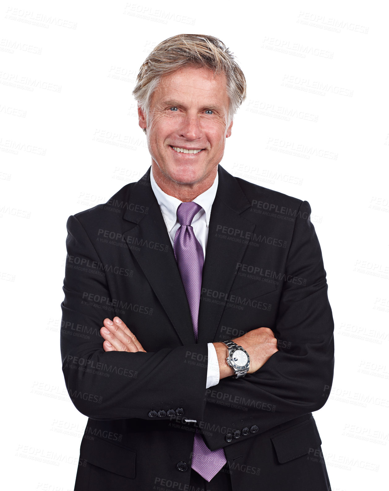 Buy stock photo Cropped portrait of a businessman standing with his arms folded against a white background