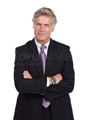 Buy stock photo Cropped portrait of a businessman standing with his arms folded against a white background