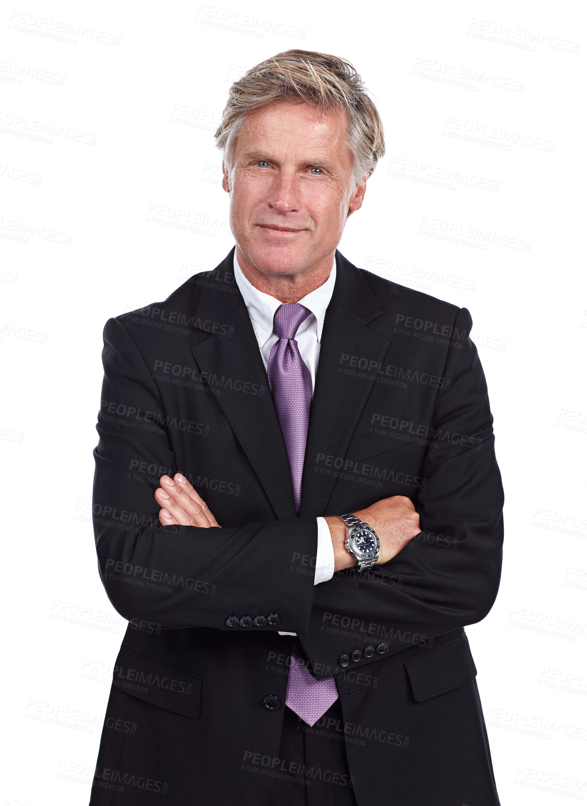 Buy stock photo Cropped portrait of a businessman standing with his arms folded against a white background