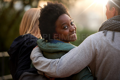 Buy stock photo Rearview shot of three young students on campus
