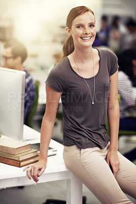 Buy stock photo Smile, office and portrait of woman by desk with pride, confidence and happiness for small business. Face, graphic designer and leaning on table with creative, job and research project at workplace