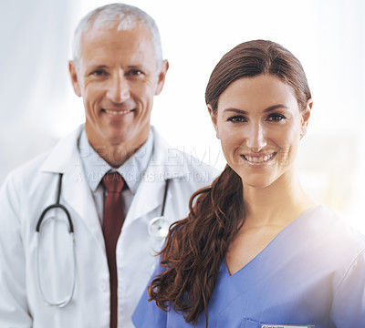 Buy stock photo Doctor, nurse and happy together in portrait with smile, medical support and wellness in hospital. Medic, mature man and woman in team, smile and healthcare services in clinic with pride for career