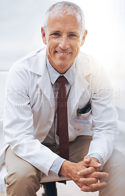 Buy stock photo Portrait, senior doctor and happy man in hospital for healthcare, wellness or work in Australia for career. Smile, medical professional or confident surgeon or expert physician in clinic for service